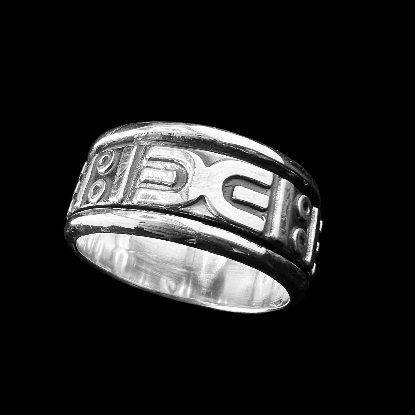Silver Ring with Symbols