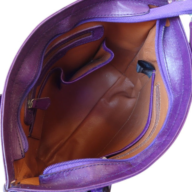 IOWA Handtooled Leather Handbag
14"x4"x11"
Purple Color