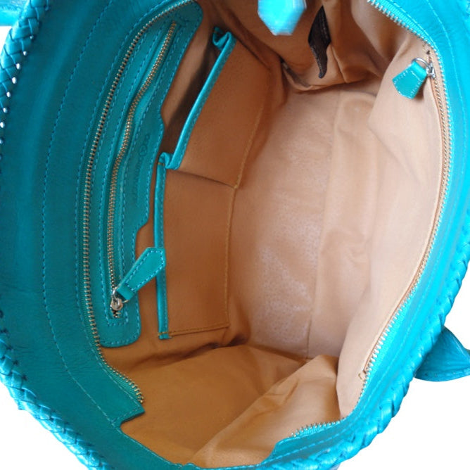 XECUL Handtooled Leather Handbag
16"x10"6"
Turquoise Color
