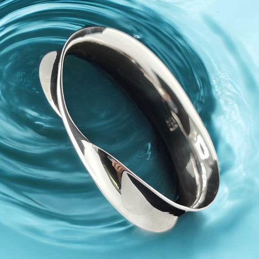 Sterling Silver .925 Bangle Bracelet 70mmx15mm Cupped Smooth with Twist
